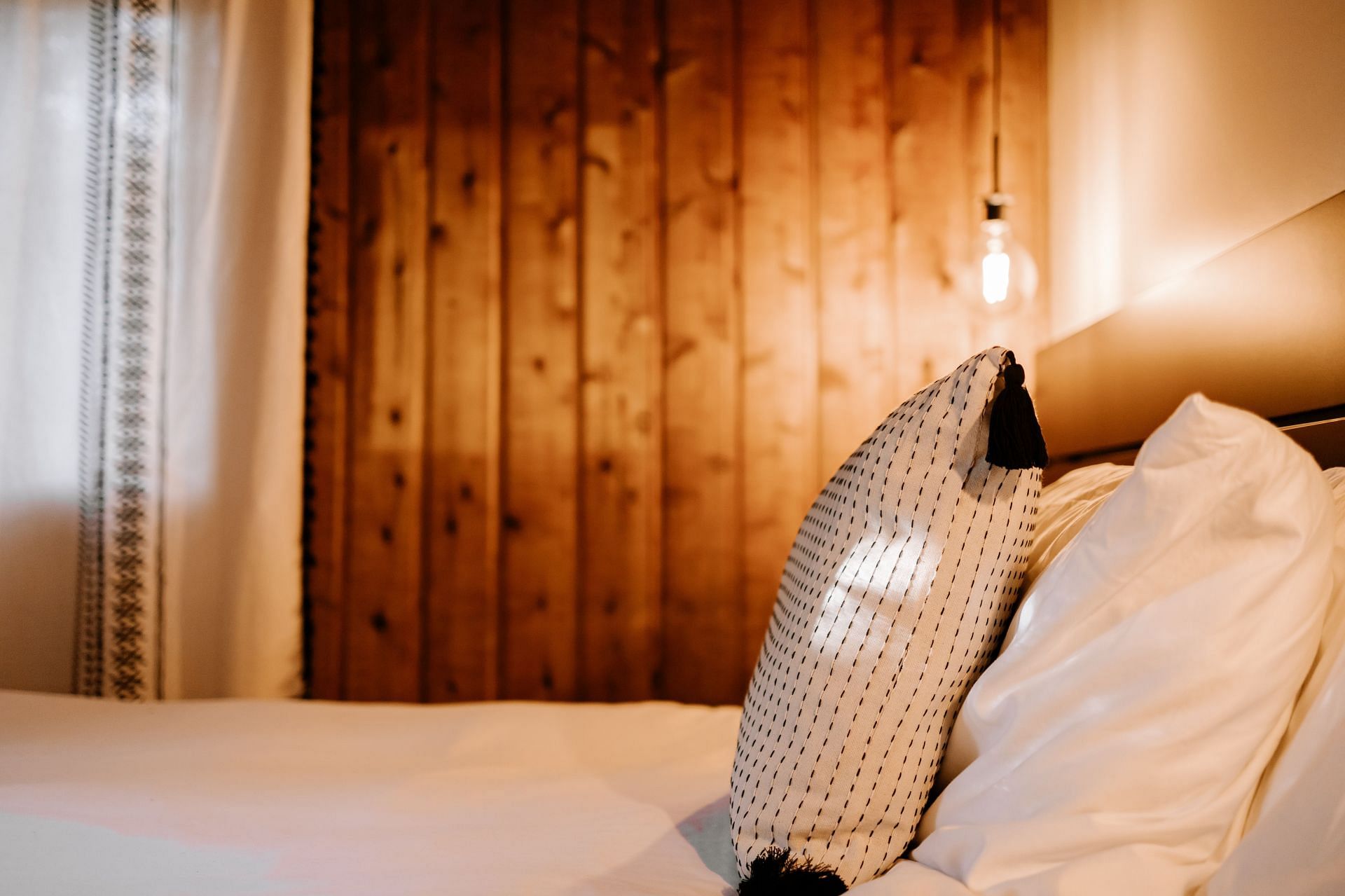 Experiment with different sleeping positions (Image via Unsplash/Hans Issacson)